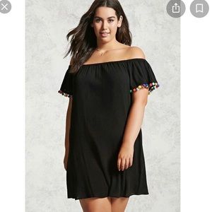 Black dress with PomPom sleeve detail